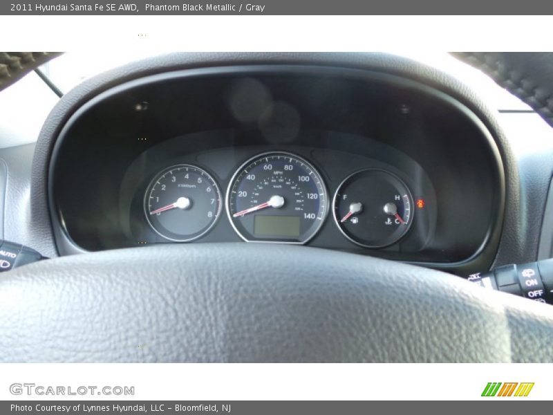 Phantom Black Metallic / Gray 2011 Hyundai Santa Fe SE AWD