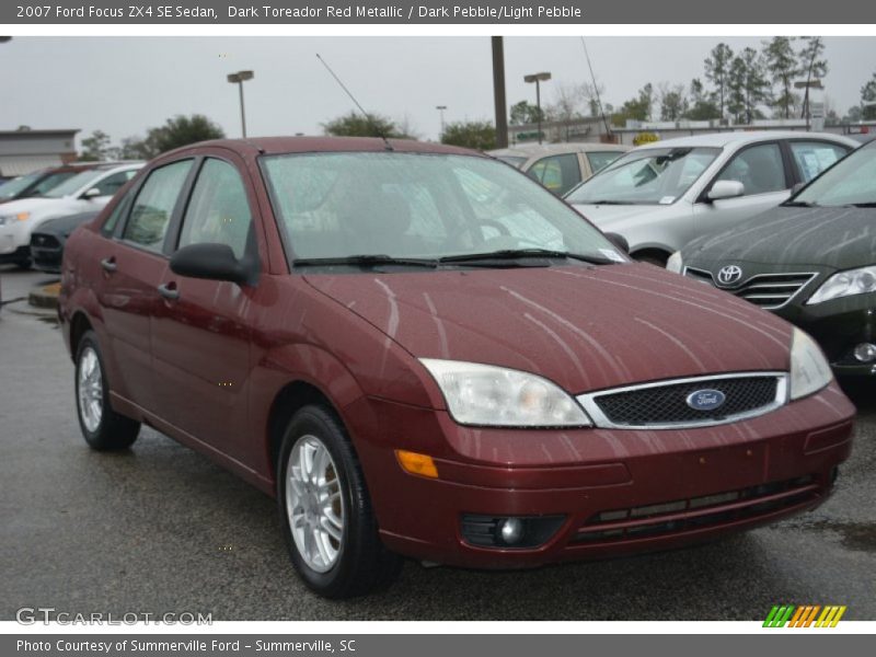 Dark Toreador Red Metallic / Dark Pebble/Light Pebble 2007 Ford Focus ZX4 SE Sedan