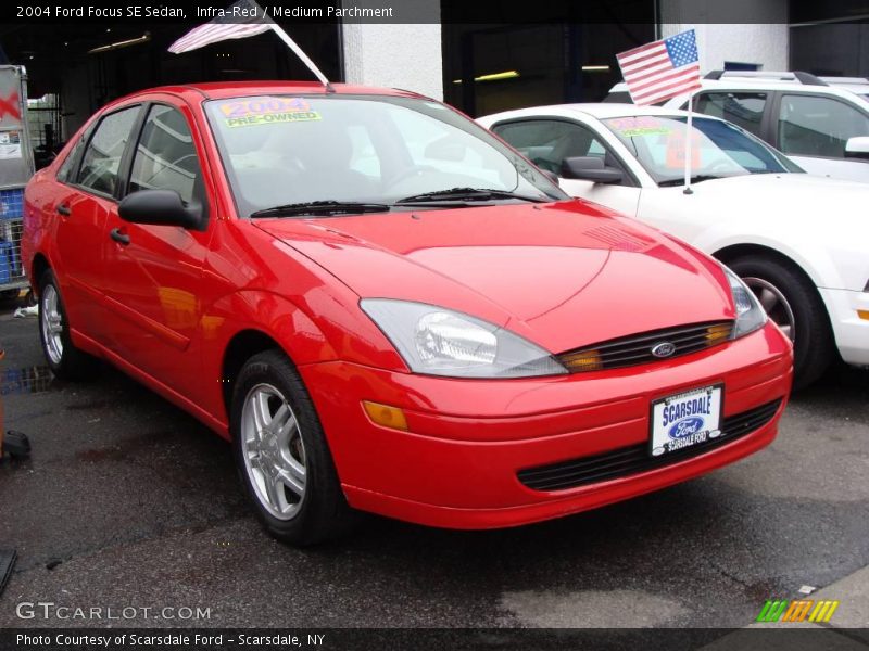 Infra-Red / Medium Parchment 2004 Ford Focus SE Sedan