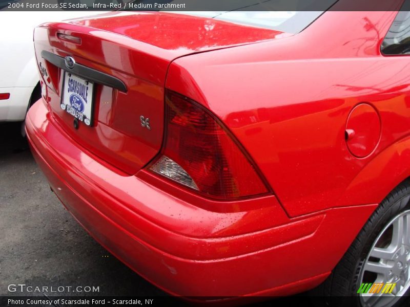 Infra-Red / Medium Parchment 2004 Ford Focus SE Sedan