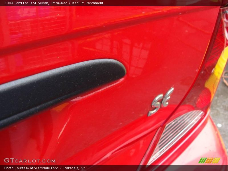 Infra-Red / Medium Parchment 2004 Ford Focus SE Sedan