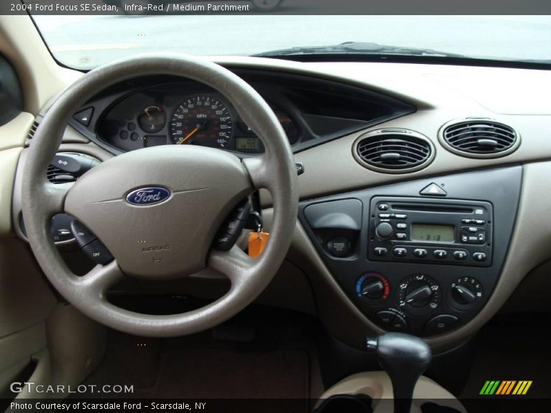 Infra-Red / Medium Parchment 2004 Ford Focus SE Sedan