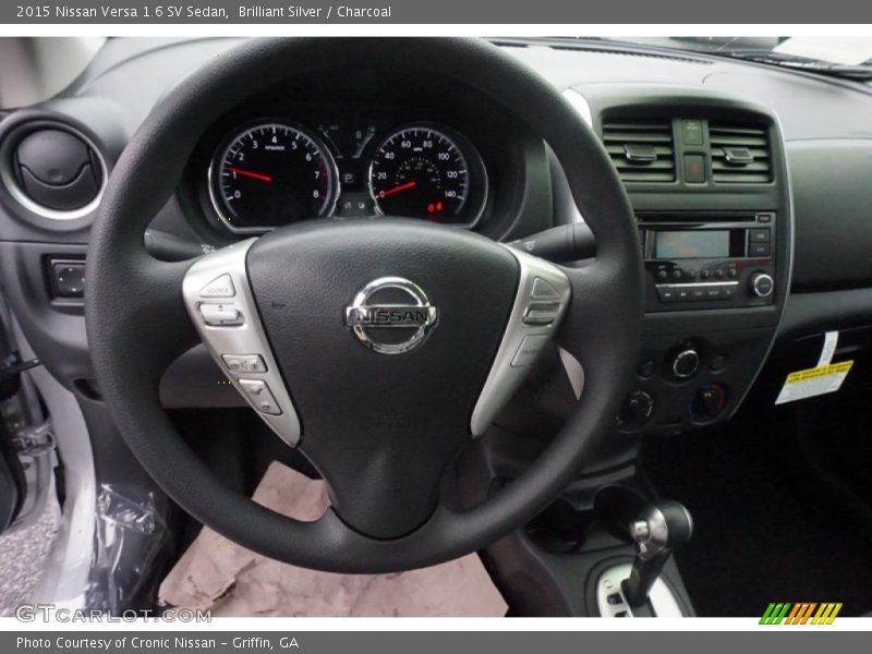 Brilliant Silver / Charcoal 2015 Nissan Versa 1.6 SV Sedan
