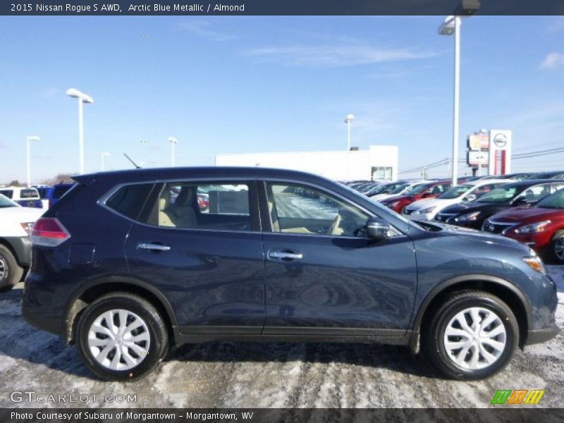 Arctic Blue Metallic / Almond 2015 Nissan Rogue S AWD