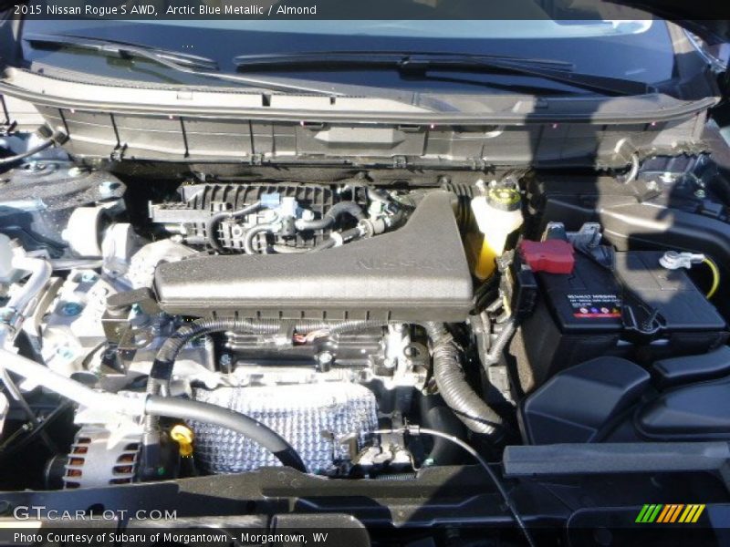 Arctic Blue Metallic / Almond 2015 Nissan Rogue S AWD