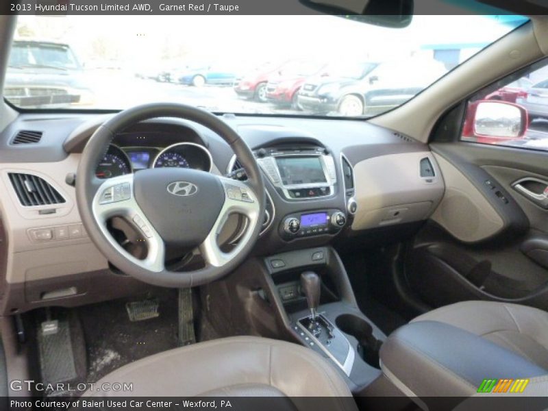 Garnet Red / Taupe 2013 Hyundai Tucson Limited AWD