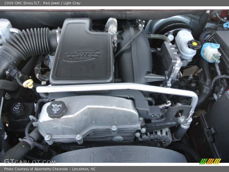 Red Jewel / Light Gray 2009 GMC Envoy SLT