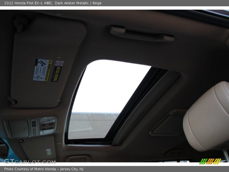 Dark Amber Metallic / Beige 2012 Honda Pilot EX-L 4WD