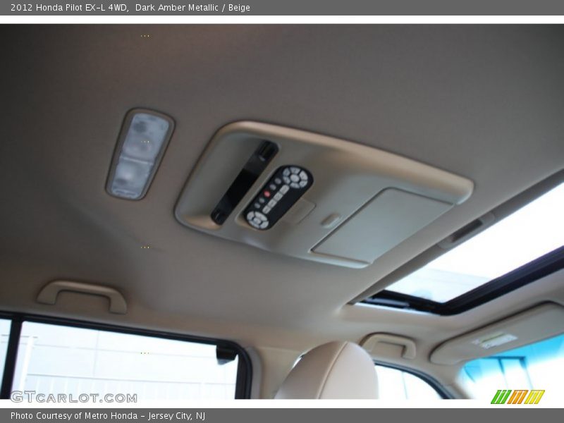 Dark Amber Metallic / Beige 2012 Honda Pilot EX-L 4WD