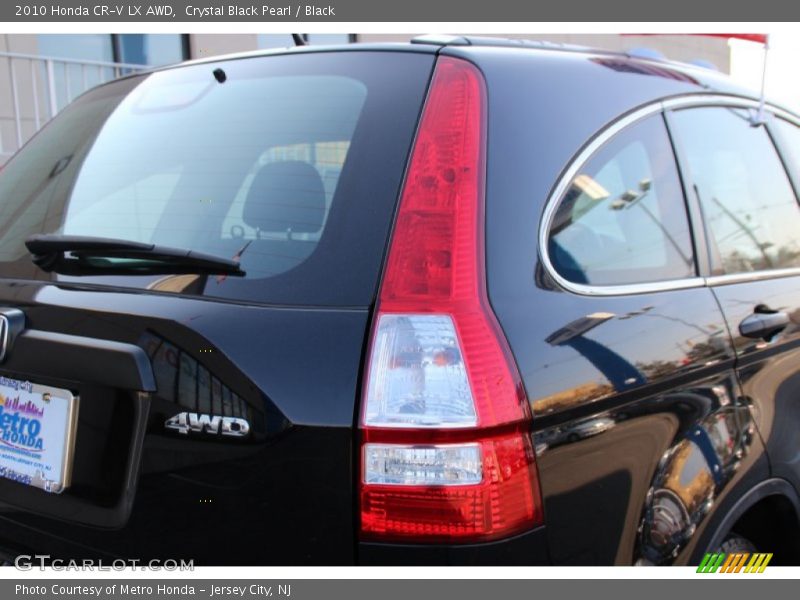 Crystal Black Pearl / Black 2010 Honda CR-V LX AWD