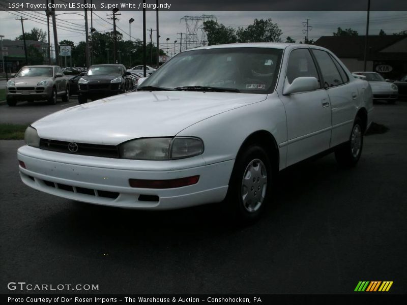 Super White / Burgundy 1994 Toyota Camry LE Sedan