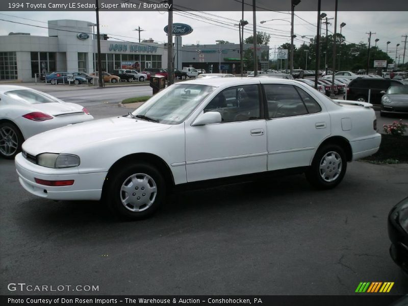 Super White / Burgundy 1994 Toyota Camry LE Sedan