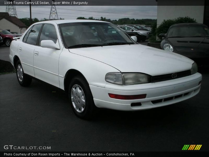 Super White / Burgundy 1994 Toyota Camry LE Sedan