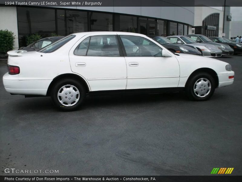 Super White / Burgundy 1994 Toyota Camry LE Sedan