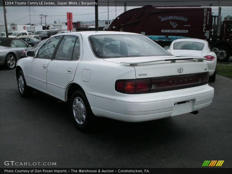 Super White / Burgundy 1994 Toyota Camry LE Sedan