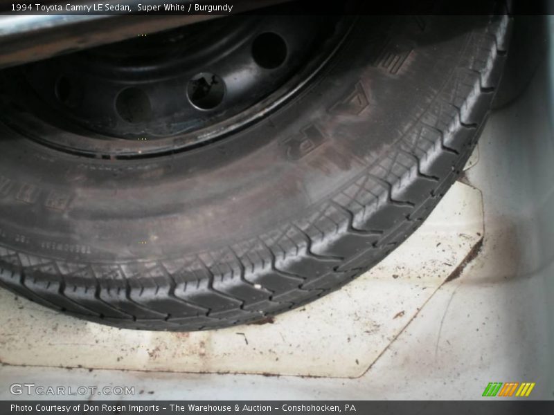 Super White / Burgundy 1994 Toyota Camry LE Sedan