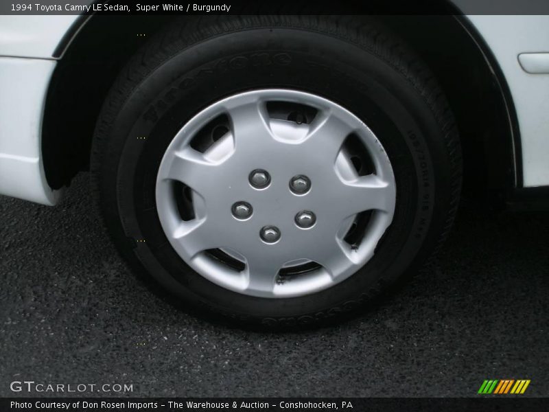 Super White / Burgundy 1994 Toyota Camry LE Sedan