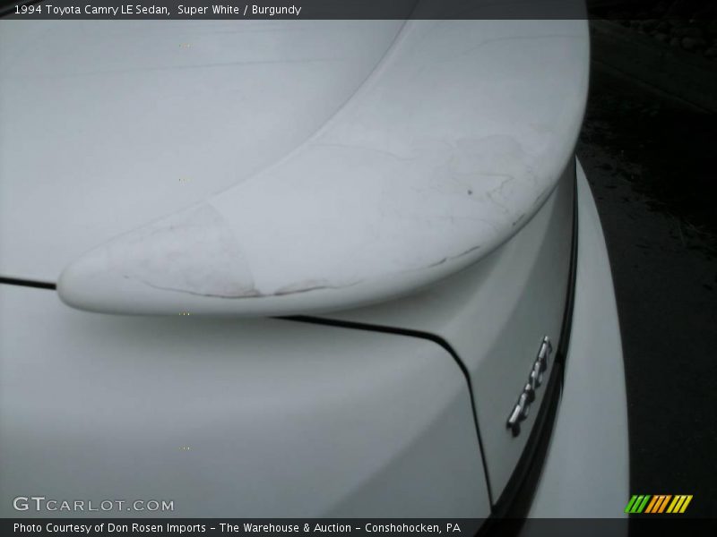 Super White / Burgundy 1994 Toyota Camry LE Sedan
