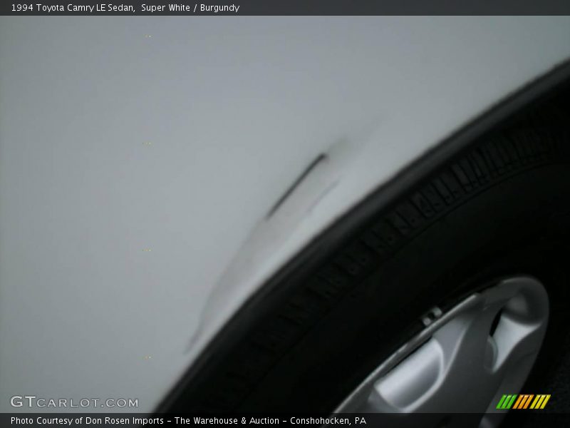 Super White / Burgundy 1994 Toyota Camry LE Sedan