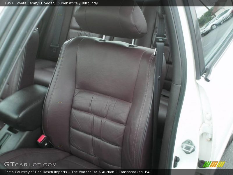 Super White / Burgundy 1994 Toyota Camry LE Sedan