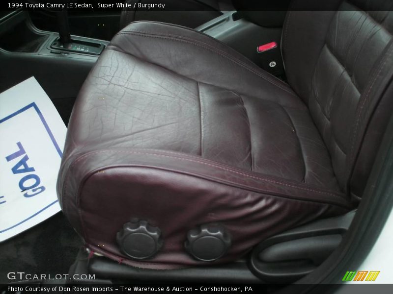 Super White / Burgundy 1994 Toyota Camry LE Sedan