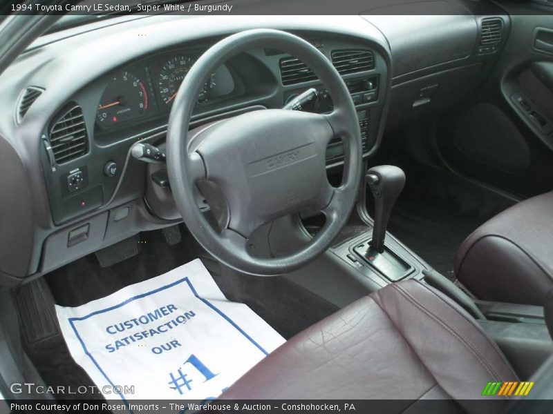 Super White / Burgundy 1994 Toyota Camry LE Sedan