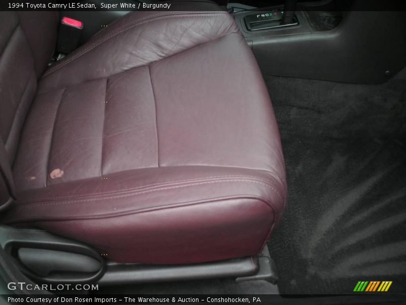 Super White / Burgundy 1994 Toyota Camry LE Sedan