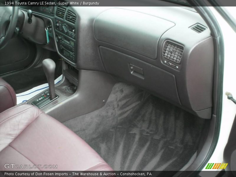 Super White / Burgundy 1994 Toyota Camry LE Sedan