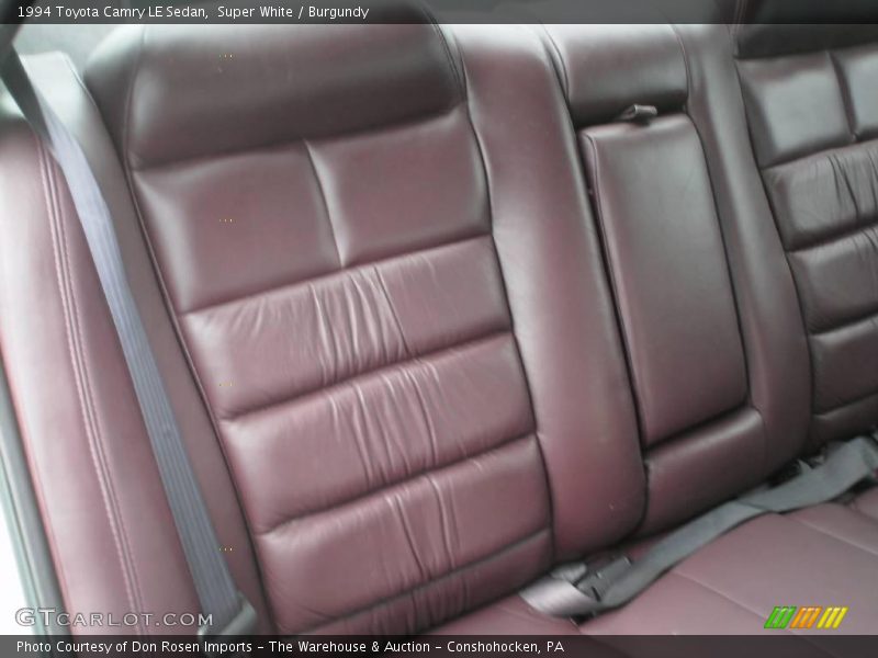 Super White / Burgundy 1994 Toyota Camry LE Sedan
