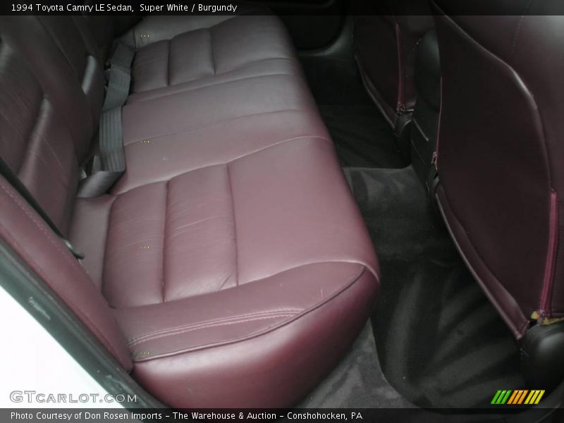 Super White / Burgundy 1994 Toyota Camry LE Sedan