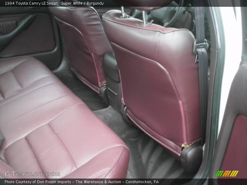 Super White / Burgundy 1994 Toyota Camry LE Sedan