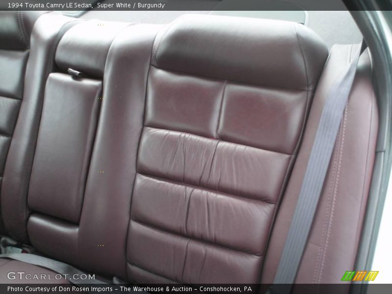 Super White / Burgundy 1994 Toyota Camry LE Sedan
