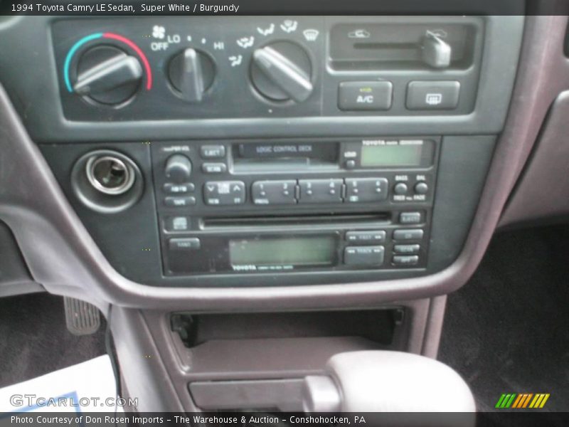 Super White / Burgundy 1994 Toyota Camry LE Sedan