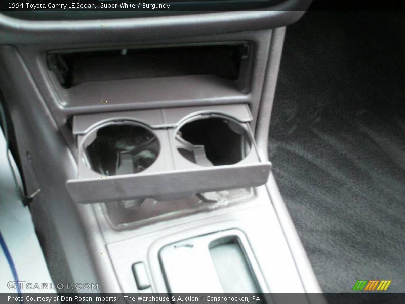 Super White / Burgundy 1994 Toyota Camry LE Sedan