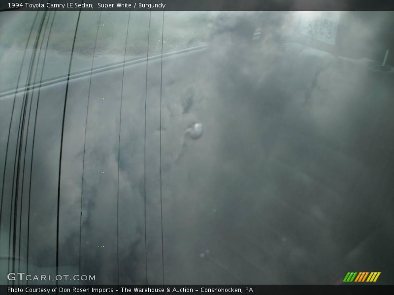 Super White / Burgundy 1994 Toyota Camry LE Sedan