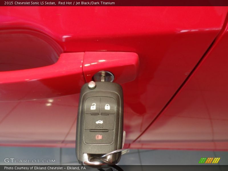 Red Hot / Jet Black/Dark Titanium 2015 Chevrolet Sonic LS Sedan