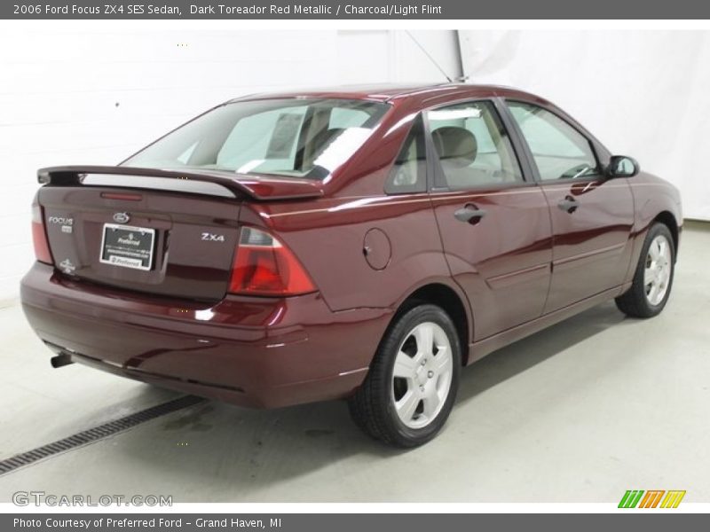 Dark Toreador Red Metallic / Charcoal/Light Flint 2006 Ford Focus ZX4 SES Sedan