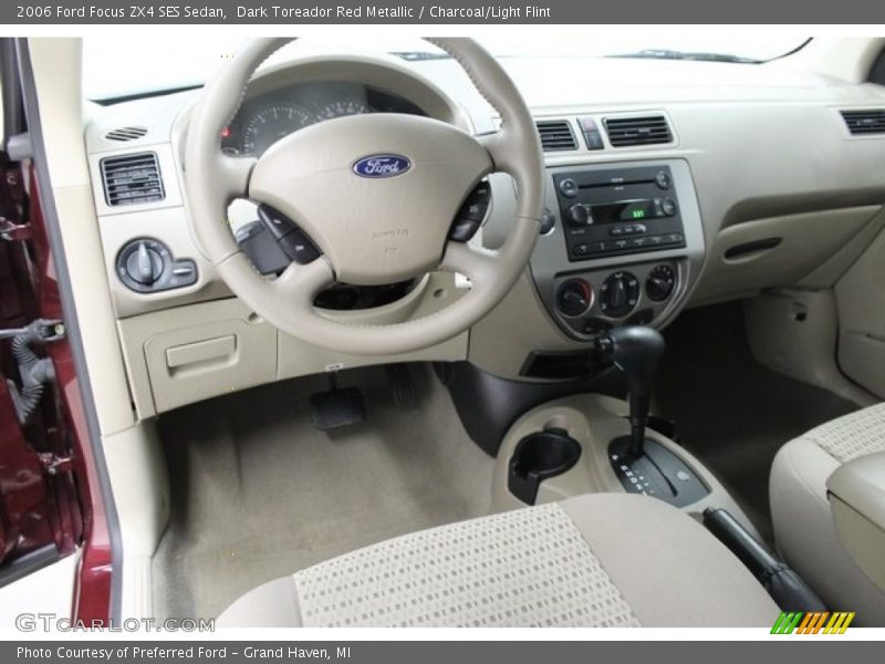 Dark Toreador Red Metallic / Charcoal/Light Flint 2006 Ford Focus ZX4 SES Sedan
