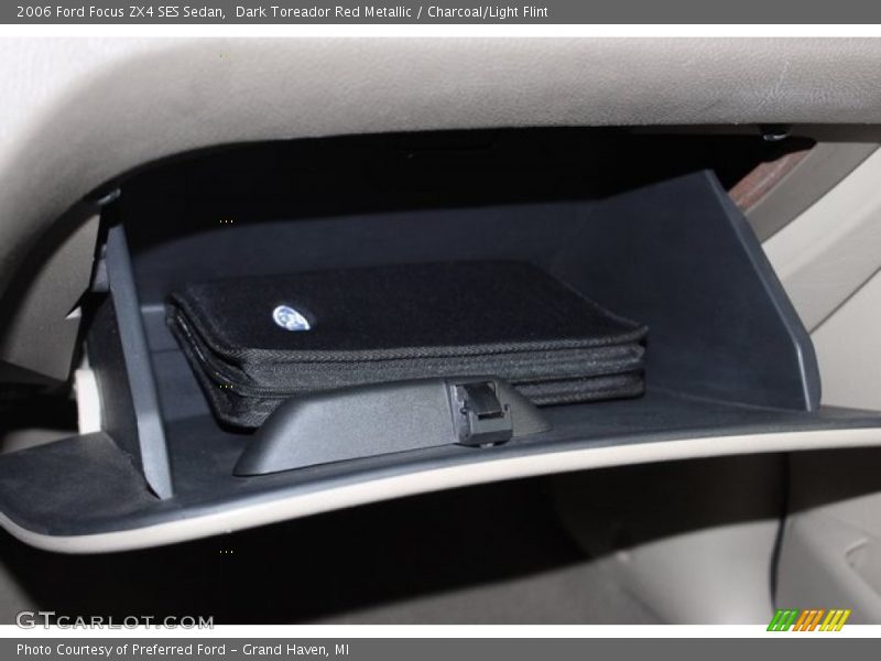 Dark Toreador Red Metallic / Charcoal/Light Flint 2006 Ford Focus ZX4 SES Sedan
