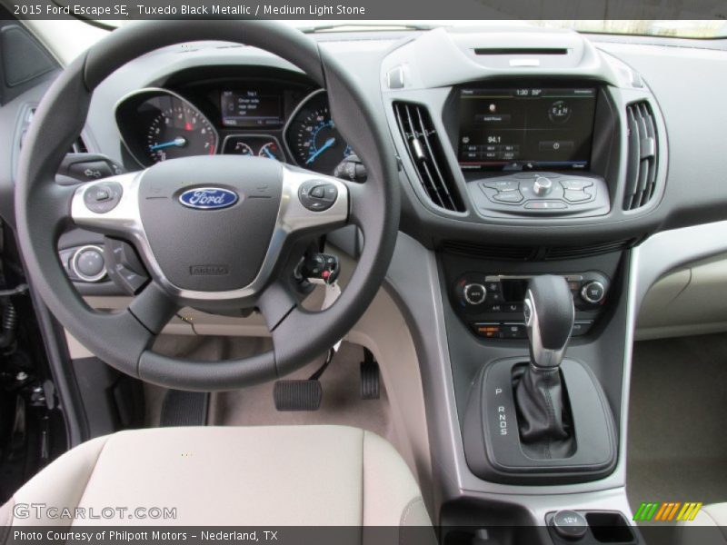 Tuxedo Black Metallic / Medium Light Stone 2015 Ford Escape SE