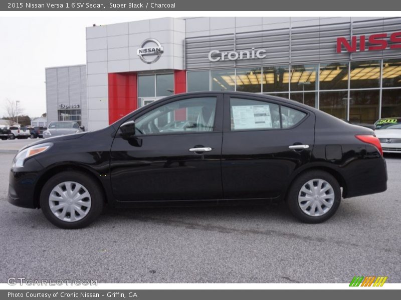 Super Black / Charcoal 2015 Nissan Versa 1.6 SV Sedan