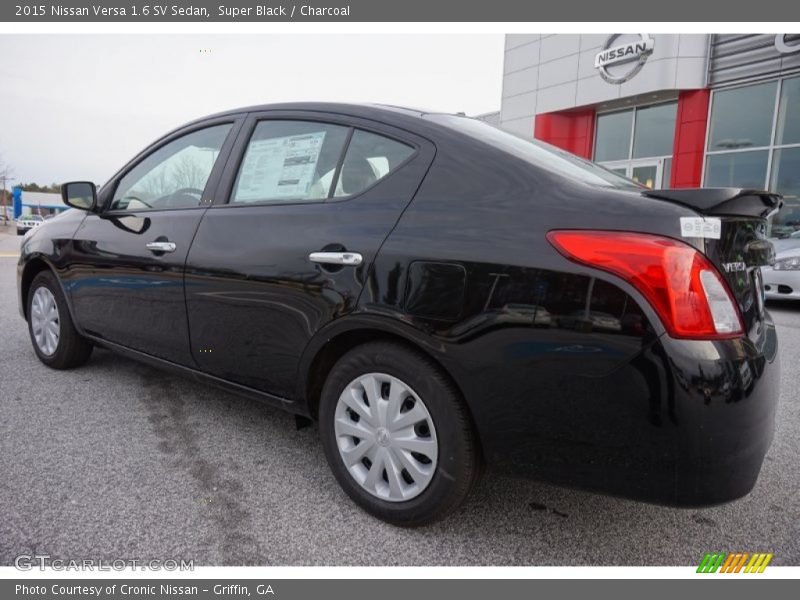 Super Black / Charcoal 2015 Nissan Versa 1.6 SV Sedan