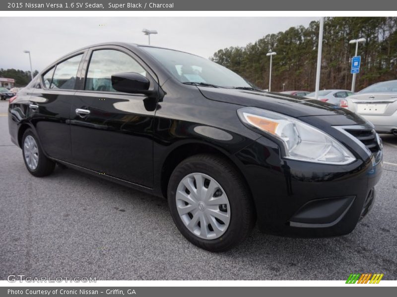 Super Black / Charcoal 2015 Nissan Versa 1.6 SV Sedan