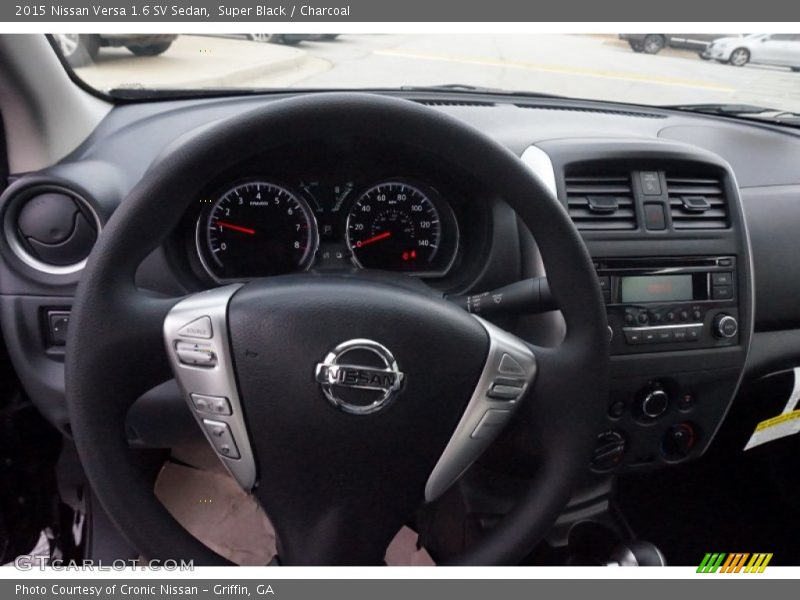 Super Black / Charcoal 2015 Nissan Versa 1.6 SV Sedan