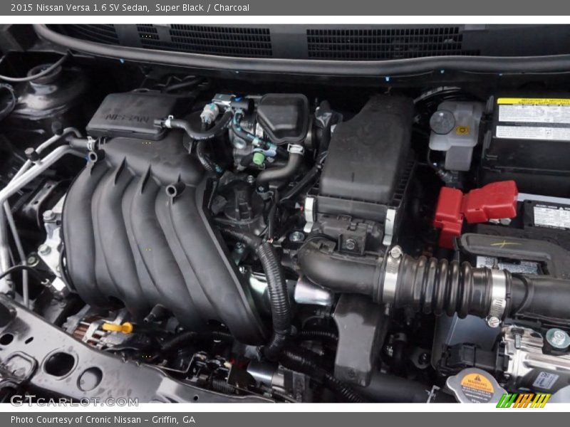 Super Black / Charcoal 2015 Nissan Versa 1.6 SV Sedan