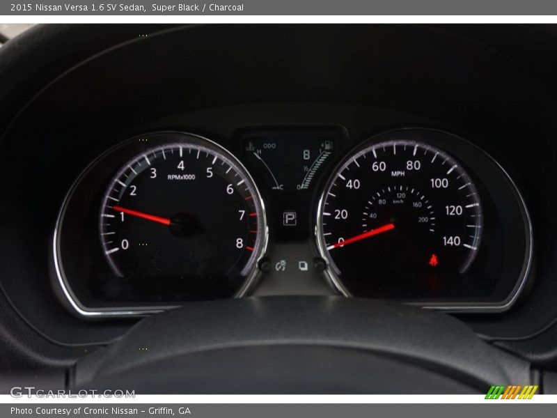 Super Black / Charcoal 2015 Nissan Versa 1.6 SV Sedan