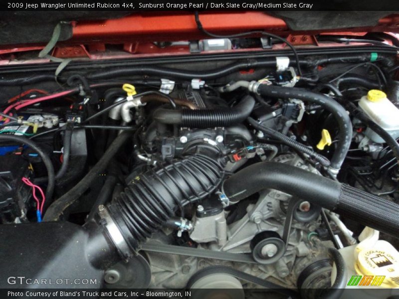 Sunburst Orange Pearl / Dark Slate Gray/Medium Slate Gray 2009 Jeep Wrangler Unlimited Rubicon 4x4