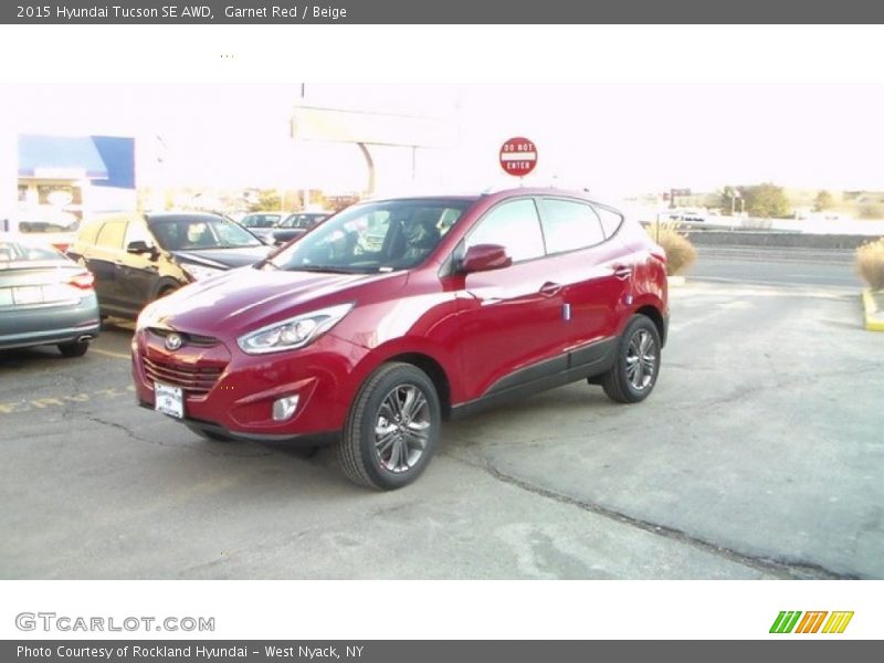 Garnet Red / Beige 2015 Hyundai Tucson SE AWD