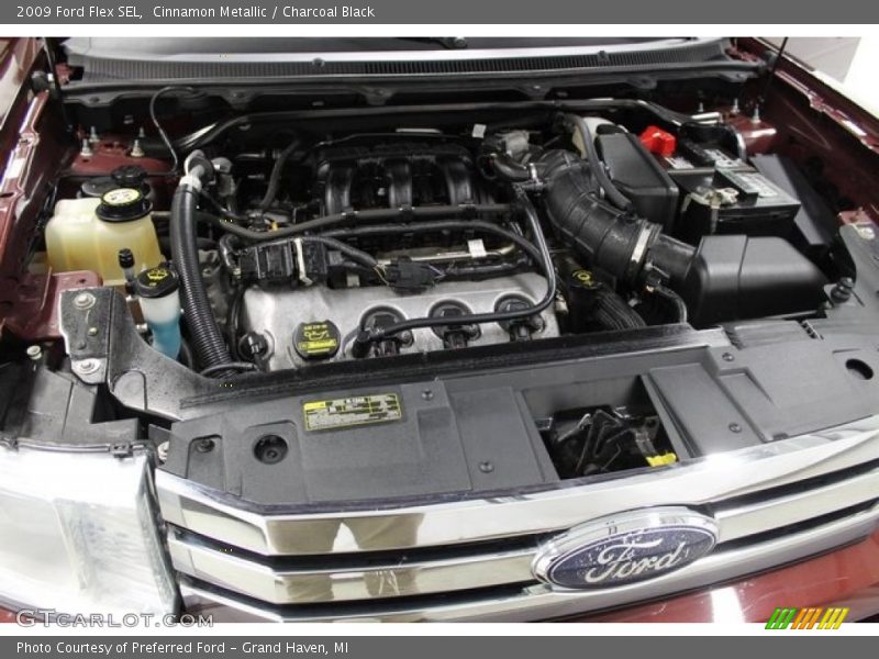 Cinnamon Metallic / Charcoal Black 2009 Ford Flex SEL
