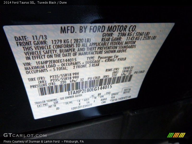 Tuxedo Black / Dune 2014 Ford Taurus SEL
